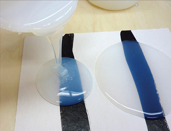 Left to right: Clear Pouring Medium (Thick) and Clear Pouring Medium (Thin).