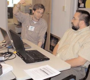 Pictured left to right: Dr. Greg Smith and Jim Hayes collaborate on research that was conducted for the recent Modern Paints Uncovered Symposium at Tate Modern in London.