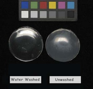 Figure 2: Surfactant Exudates - pours of acrylic disperson polymer. Right: untreated pour; Left: pour washed/soaked with water. After 2 weeks of drying, this pour was soaked in water for 10 minutes, then dried.