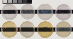 Various gloss acrylic gel medium, approximately 1/4 inch. Top row are unexposed controls. Bottom row demonstrates color change after exposure to 400 hours UVA.