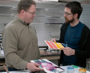 Mike Townsend (left) and Ulysses Jackson (right), both part of the Technical Support Services Team, discuss testing results.