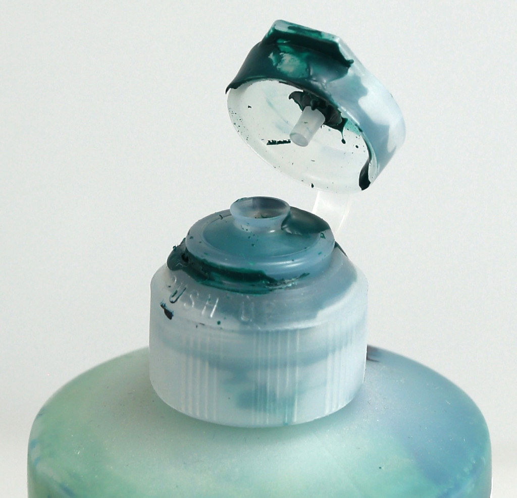For air tight closure remove dried and wet paint from the inside and outside of the bottom and top of the cap.