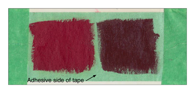 (Image 7) Williamsburg Cadmium Red Medium and Mars Violet painted directly onto the adhesive side of a green painter's tape. Both paints dried glossy.