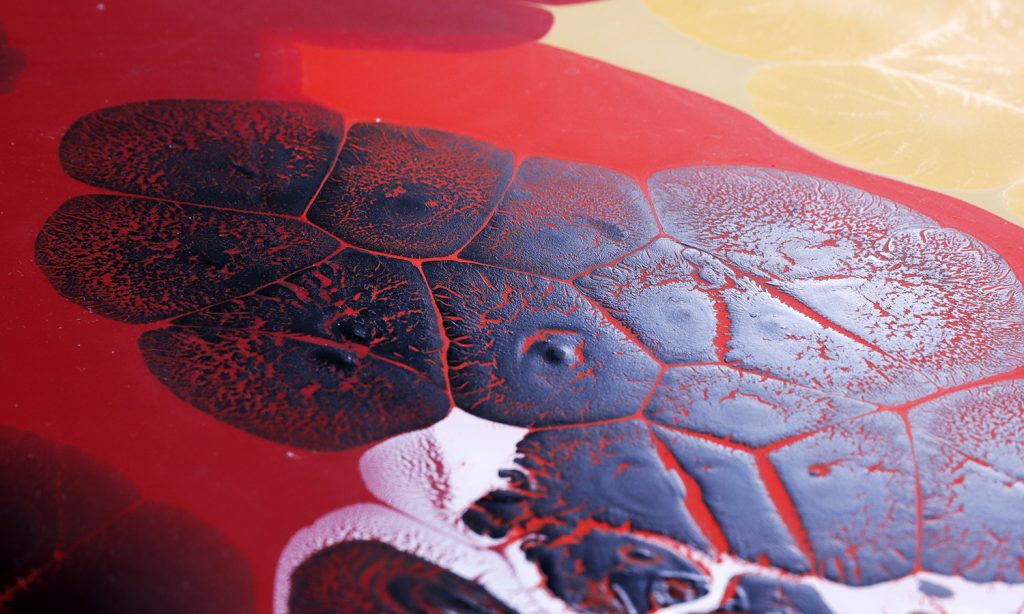 High Flow Colors dropped onto a bed of Color Pouring Medium Matte 