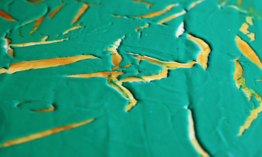 A high solids green layer applied over a mixture of gold and Clear Tar Gel