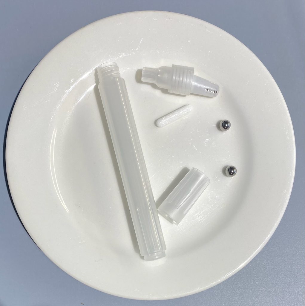 image of disassembled paint marker