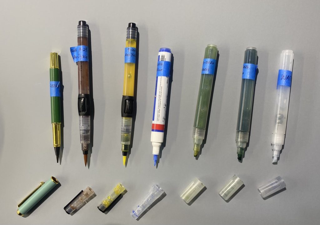 image of the paint makers and brush pens used for test study of cabin, tools are filled with diluted QoR Watercolor or water