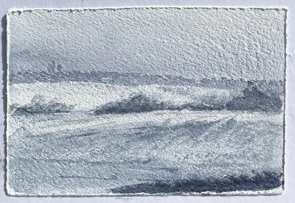 image of snowy fields in afternoon, test of diluted QoR Payne's Gray Watercolor and a marker filled with water applied to a dry QoR Cold Press Ground surface