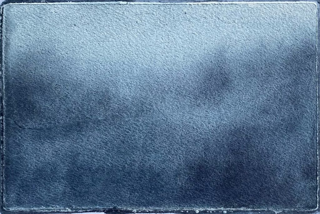 image of darker foggy day, test of diluted QoR Payne's Gray Watercolor and a marker filled with water applied to a wet QoR Watercolor Ground surface