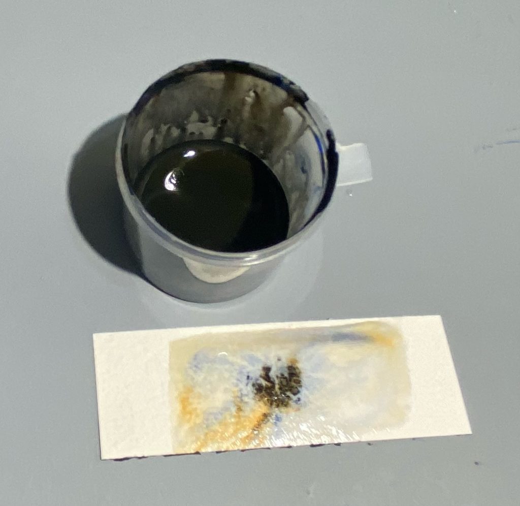 image of test on wet paper of diluted blend of 2 watercolor paints