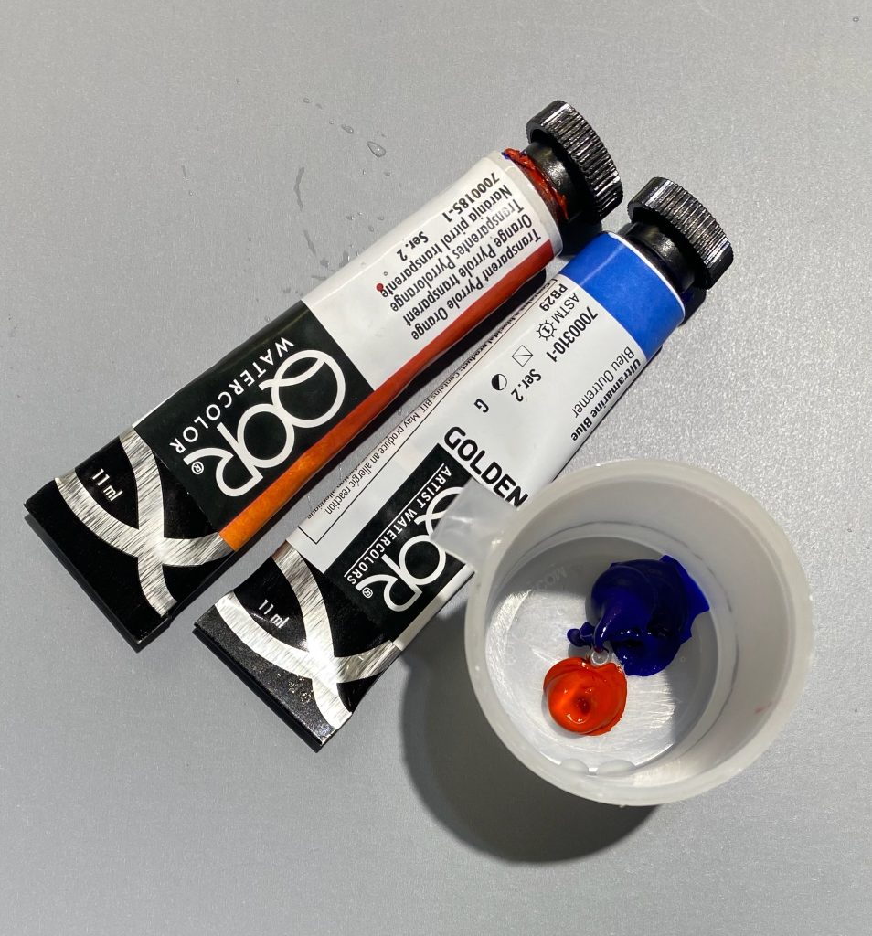 image of paint and mixing cup